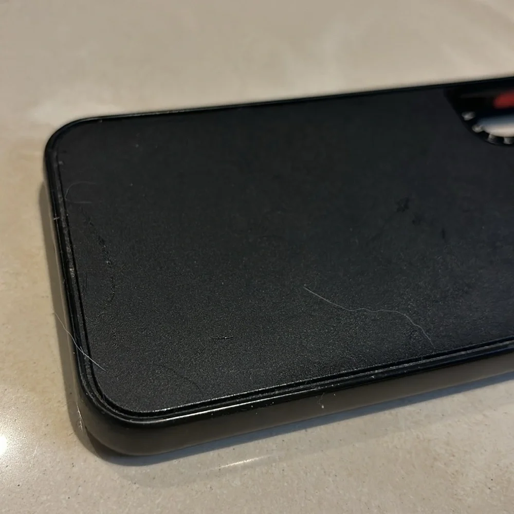 Two Samsung S22 Cases Casetify and Otterbox Black in color